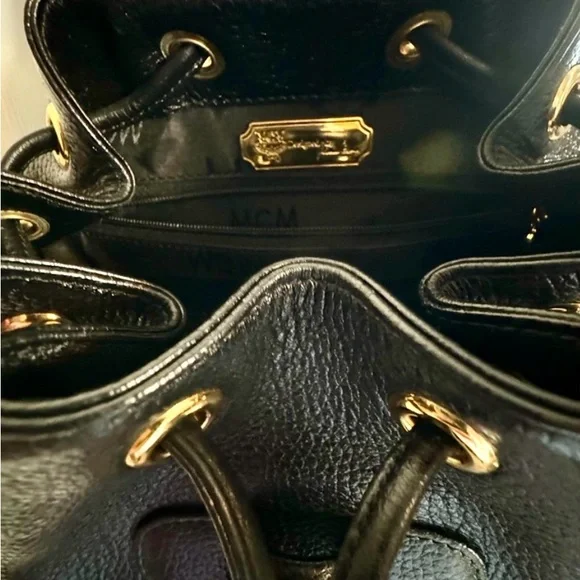 MCM Gold Studded Logo Black Pebbled Leather Backpack Tasseled Drawstring - Picture 14 of 15